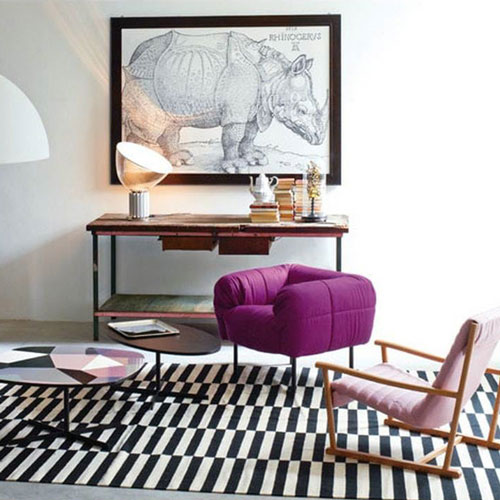 arflex pecorelle armchair in purple colour in an eclectic interiors living room