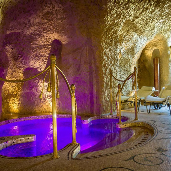Chromotherapy bath in a grotto-style steam room at Villa & Palazzo Aminta Hotel, the best Luxury lake Spa at Lake Maggiore